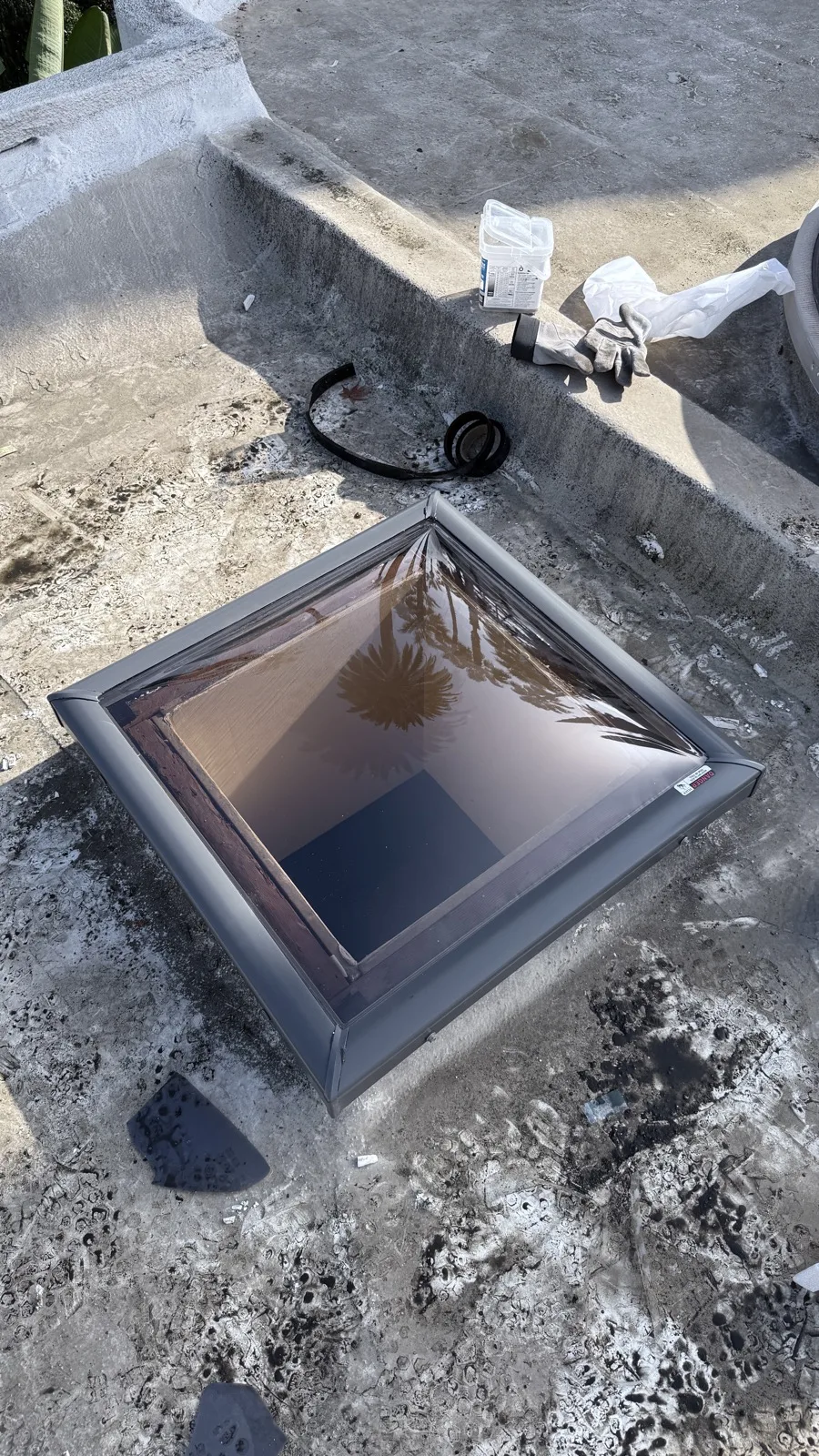 Curb-mounted flat glass skylight replacement on a residential roof in Culver City