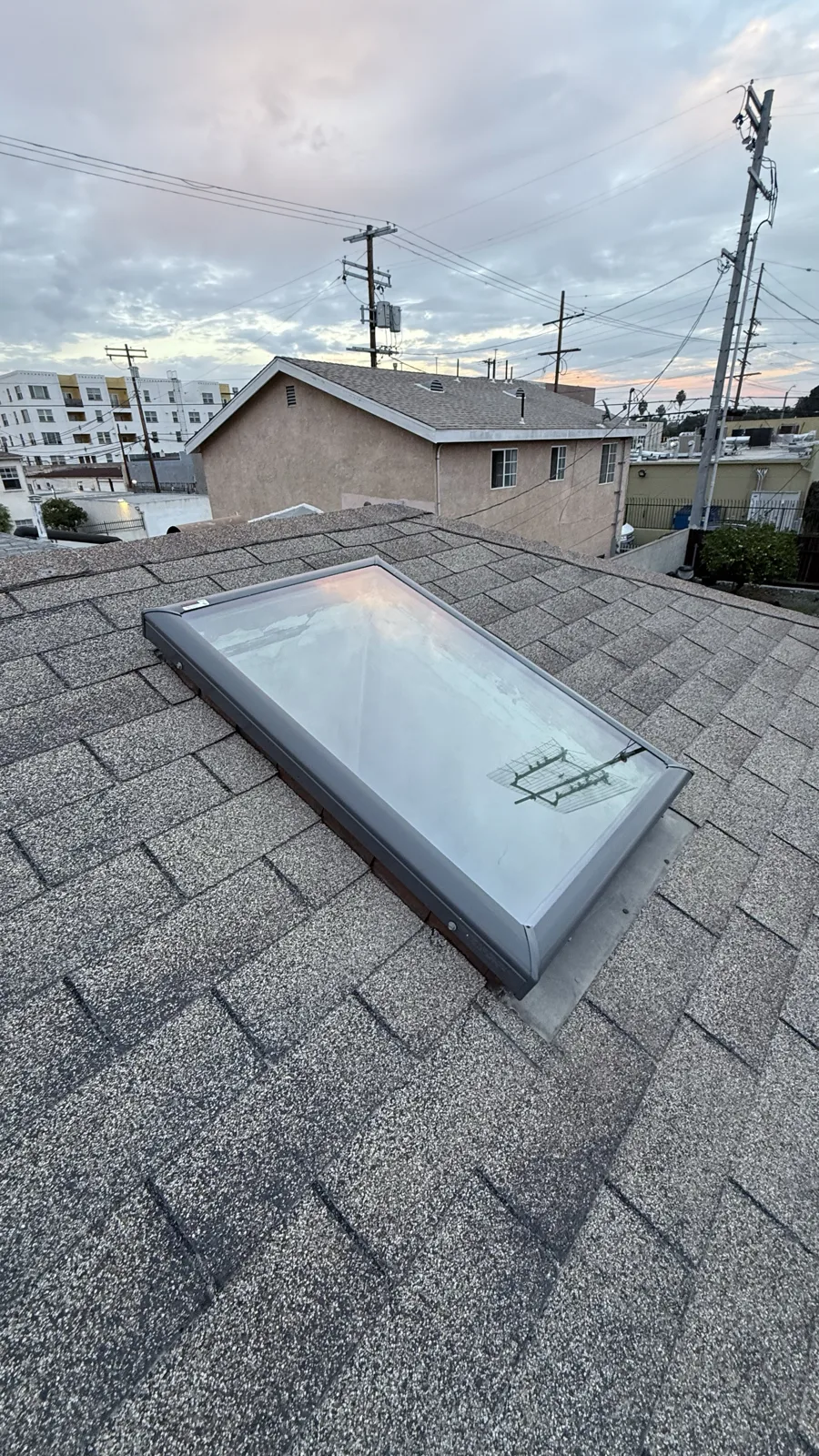 Velux FCM 2234 fixed skylight installed on a flat concrete roof in Venice, California